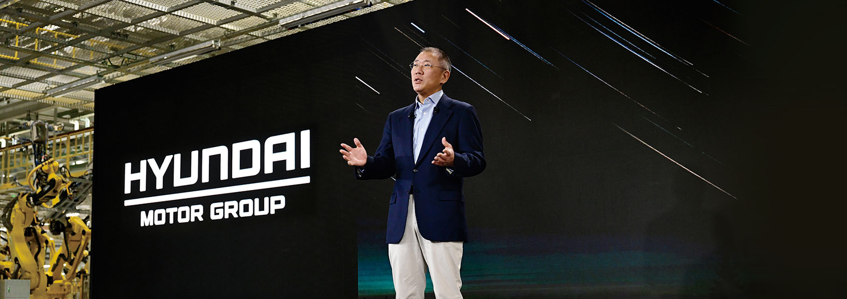 Výkonný předseda představenstva Skupiny Hyundai Motor Group (HMG) hovořící na pódiu